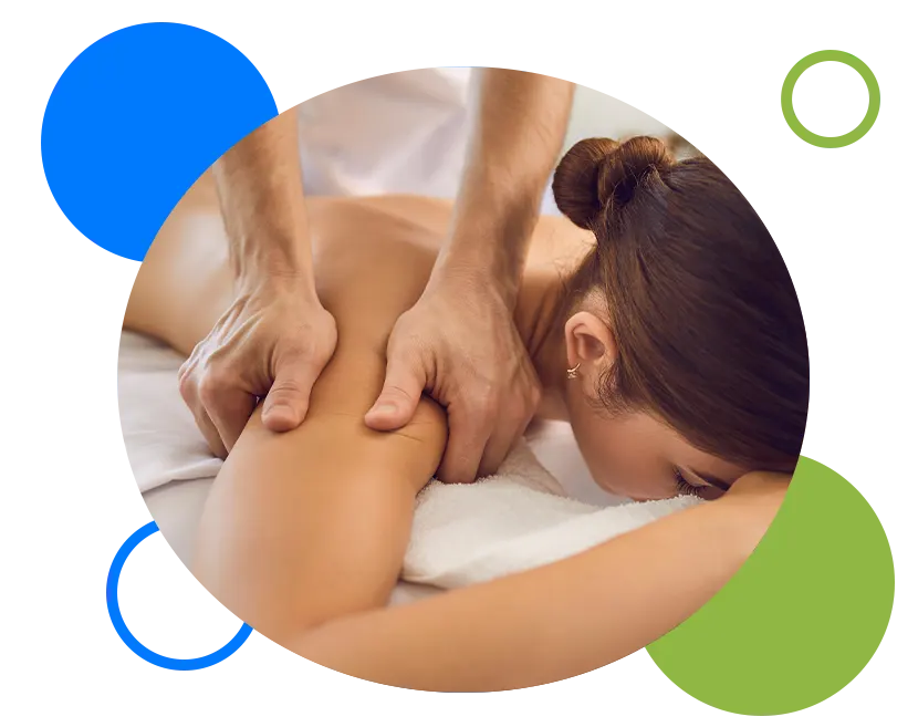 Hands of chiropractor or masseur making relaxing massage of back and arms for lying woman in clinic interior.